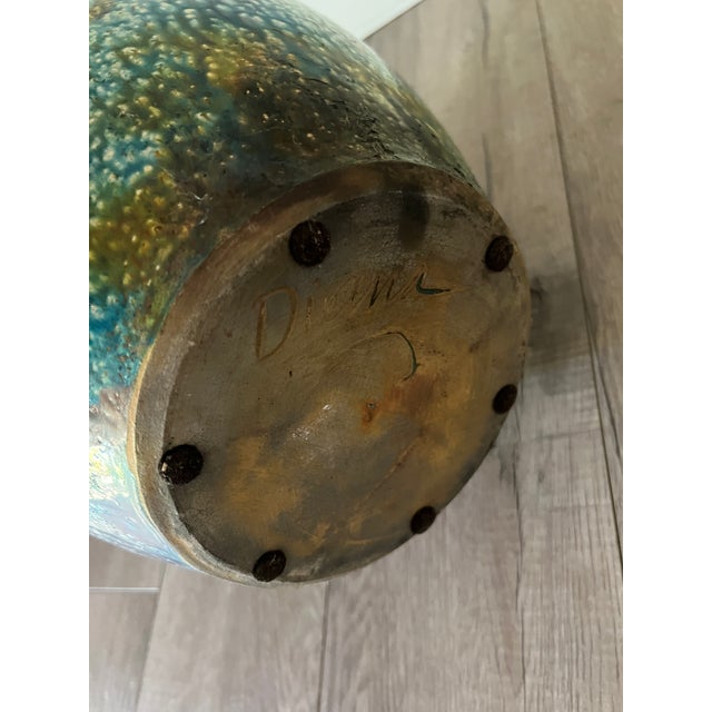 Raku-fired studio pottery vase with iridescent copper-blue luster glaze, artist-signed. Good vintage condition.