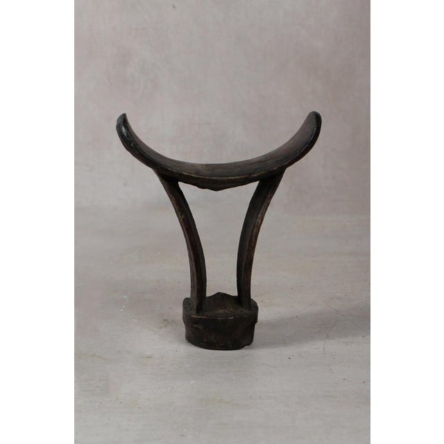 These solid wood Headrests are from groups in southern Ethiopia used to enable people to sleep without interfering with...