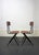 Pair of Italian chairs, 1950s design. This stylish pair of chairs, with their metal frames and Formica seats and backs,...