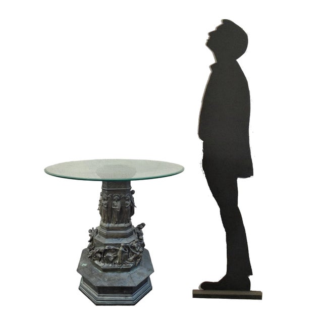 Reduction in patinated bronze with high-relief decoration of the Monument to Dante, with glass top to form a pedestal...