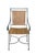 Pair of mid-century modern iron and woven wicker patio dining chairs. Displaying a striking minimalist, sculptural...