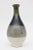 This handsome Italian unsigned glazed large ceramic vessel or vase is in the style of Fantoni. It is from the 90's. There...