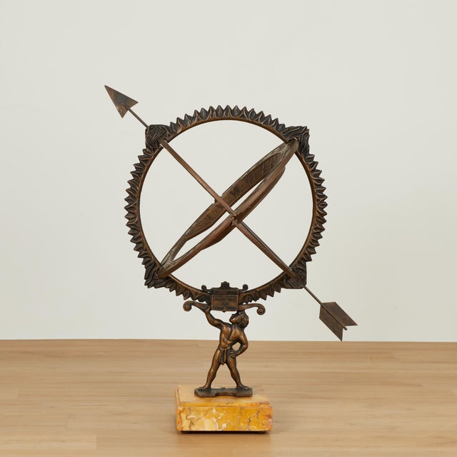 Astronomic vintage armillary sphere crafted in cast aluminum with a patinated bronze finish in classic celestial form held...
