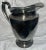 A nice vintage silver water pitcher from International Silver Company marked #527 at bottom. Elegant lines. Needs polishing.