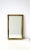 A gold giltwood bamboo style framed wall or vanity mirror in the Chinoiserie style, circa late-20th century, New York....