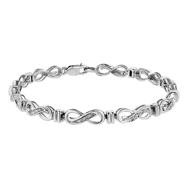 .925 Sterling Silver 1/6 Cttw Diamond Accent Infinity Link Bracelet (I-J Color, I3 Promo Clarity) - 7" For Sale