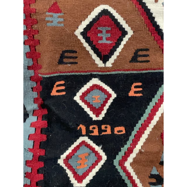 Heritage & Provenance: This vibrant, hand-woven Turkish Kilim was acquired directly from an international exchange student...