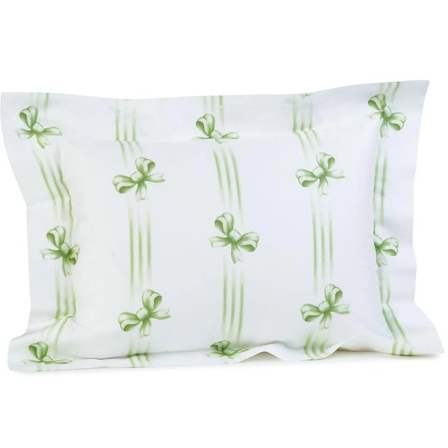 The irrepressible delight of ribbons and bows, printed in Blue, Pink or Green on White 100% Egyptian cotton sateen, 300...
