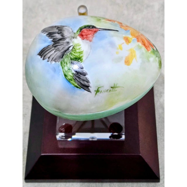 Hand-painted Gerold Porzellan Bavaria porcelain egg-shaped trinket box made in Western Germany, signed “Faucett.” The...