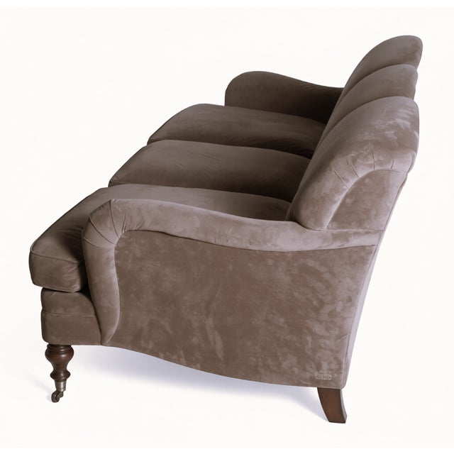 Designed by Ralph Lauren, the "Somerville" sofa features a gracefully arched double back, generous English rolled arms,...