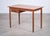 A beautifully preserved teak desk from the 1960s, offering a perfect balance between compact size and practical workspace....