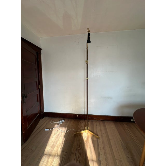 Italian mid century metal easel floor lamp by Angelo Lili for our Dias, 1960s. Metal (brass finish) easel cavaletto with...