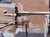 Logan and Colfax by David Shingler | Oil Painting of a city street with buildings and vehicles For Sale - Image 4 of 4