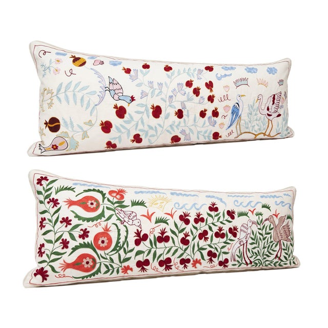 This beautiful 18'' x 53'' & 18'' x 55'' hand-embroidered Suzani pillow cover set was made from authentic Uzbek cotton...