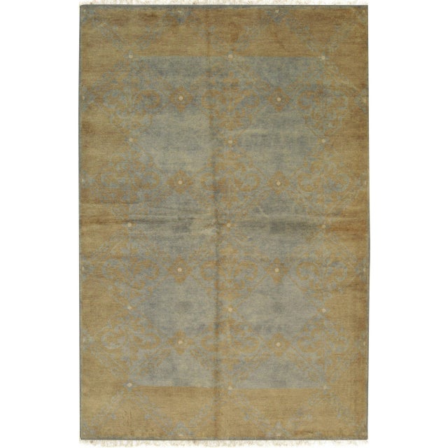 Versatile Classic Blue Hand Knotted Wool Rug, Country of Origin: China. This exquisite piece represents the refined...