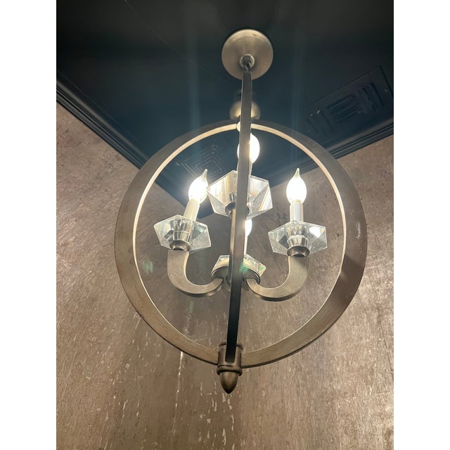 Stunning Savoy House Forum 4-Light Chandelier in a beautiful silver painted finish. Originally designed as a high-end...