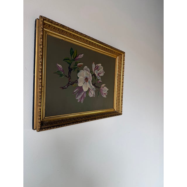A beautiful vintage still life oil on board painting depicting an elegant magnolia branch in bloom. The composition...