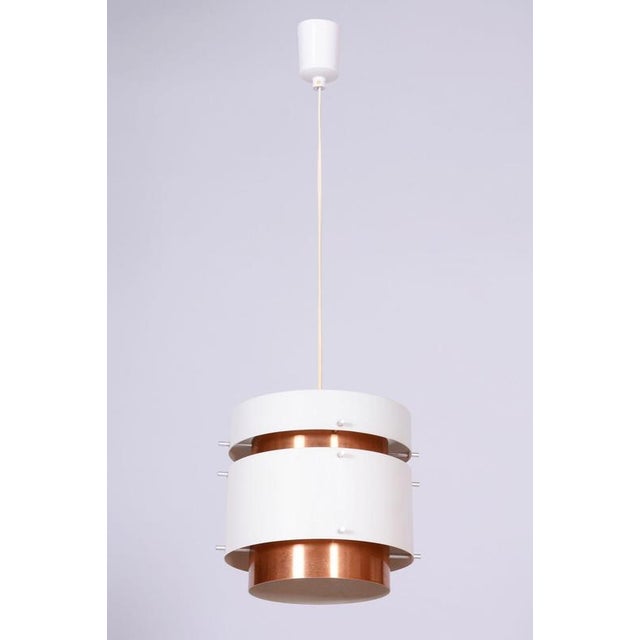 This design chandelier, created in the 1960s in Germany in the spirit of traditional GDR design, represents a magnificent...