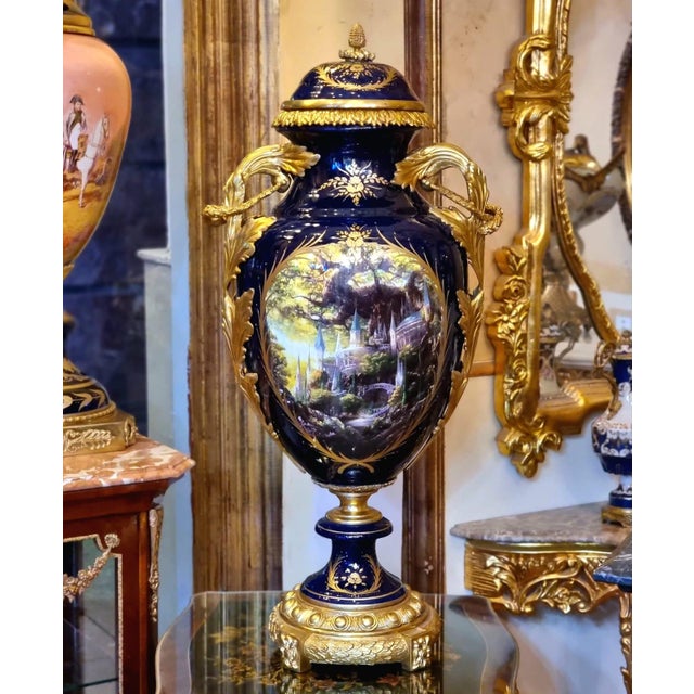 Elevate your interior with this exquisite French-style porcelain vase, a timeless decorative piece designed to bring...