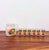 Charming vintage frosted glass beverage set consisting of a matching pitcher and six tumblers, each decorated with vibrant...