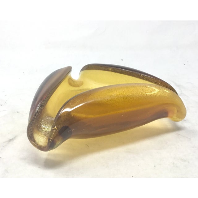 A luxurious and architecturally striking piece of Mid-Century Modern Italian art glass, confirmed by the original sticker...