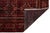 This striking vintage Persian Baluch rug features a deep, moody palette of madder red, espresso brown, and charcoal black....