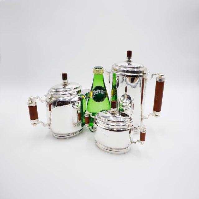 Circa 1960, we offer this Silver plated Art Deco Coffee Set. 1. Height: 23.5 cm. Width: 14.5 cm. Depth: 8 cm. 2. Height:...