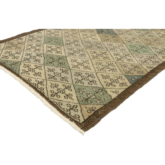 51011 Zeki Muren Distressed Vintage Turkish Sivas Rug with Swedish Farmhouse Style 02'09 X 06'05. Lovingly timeworn with...