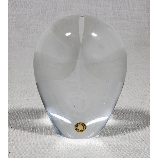 This item is a beautiful solid cut glass figure of an owl. As one can see from the photographs, it reflects the light and...