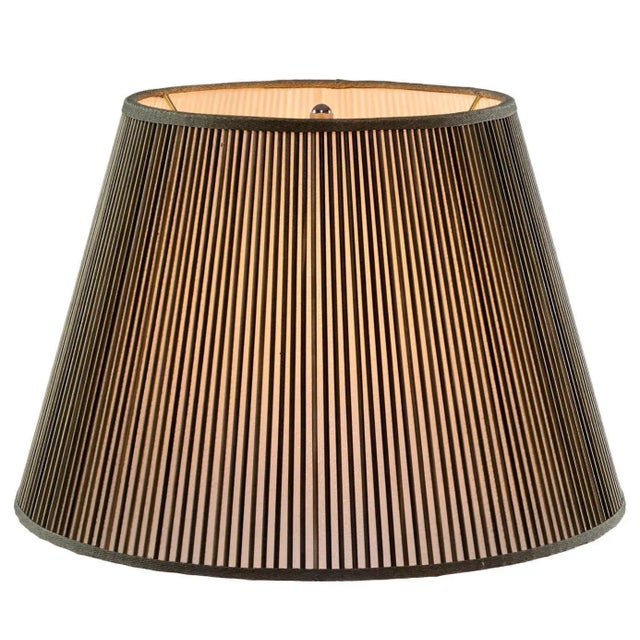 Green washed sticks are added by hand, one at a time, over artisanal, vellum paper. This Stick Shade will add charm to any...