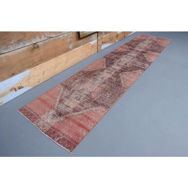 Vintage Turkish Hand-Knotted Runner Rug is a semi-Vintage runner rug. '70s Eastern region of Turkey's unique rug is...