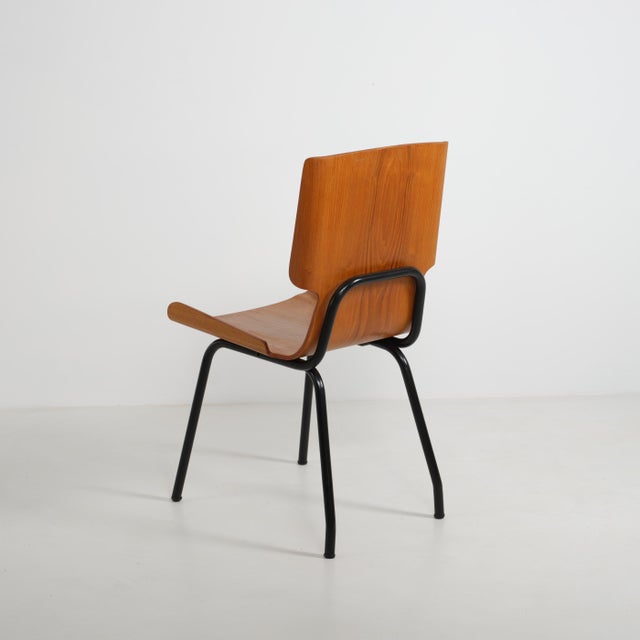 Elegant Italian design chair produced in the 1950s by Società Compensati Curvi, model 112. The chair features a...