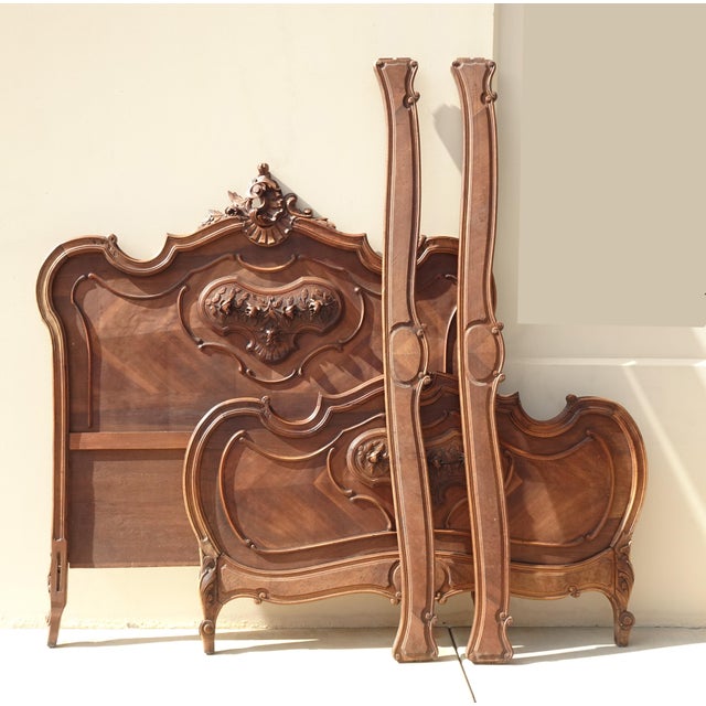 Gorgeous Bed Frame in Good Vintage Condition. It is solid and Firm. The interior of the footboard has a large area of...