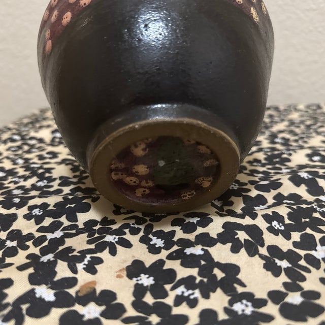 Add a touch of vibrant Mexican artistry to your kitchen with this beautifully hand-painted ceramic bowl. Featuring a...