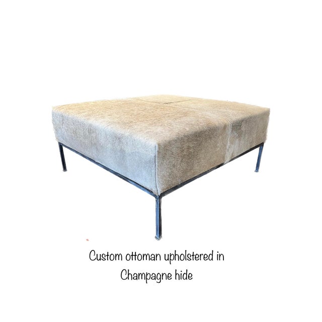 Beautiful champagne genuine hide upholstered on this deep bench- Set a tray on it for cocktails, put decorative books or...