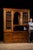 Substantial quarter-sawn oak hutch cabinet combining display, storage, and work surface functions in a form well suited to...