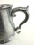 This set of antique pewter beer mugs exudes a rustic charm and old-world craftsmanship. Each mug, with its sturdy handle...