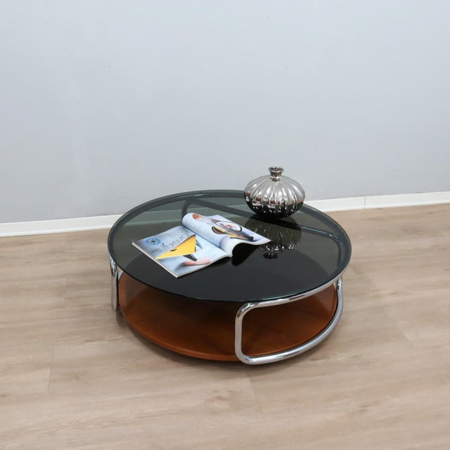 An iconic piece of 1970s Italian design, this large round coffee table seamlessly blends Space Age industrial flair with...