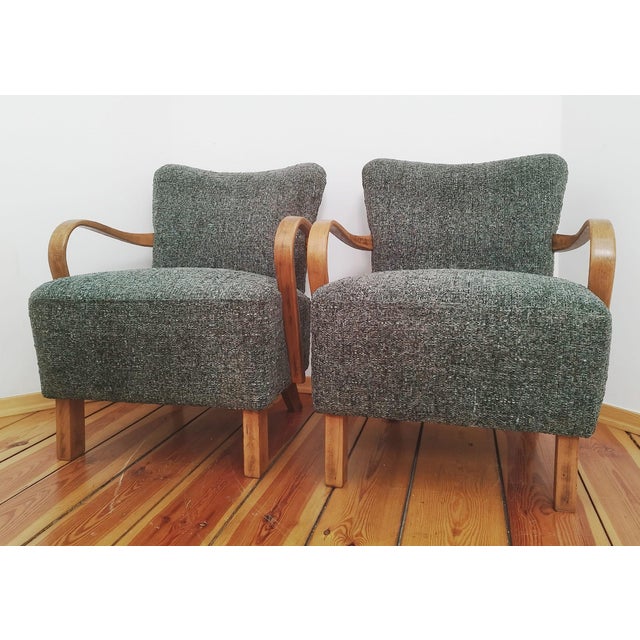 Pair of J. Halabala H 237 cocktail armchairs, Czechoslovakia, 1960s. Discover armchairs that will be perfect for your...