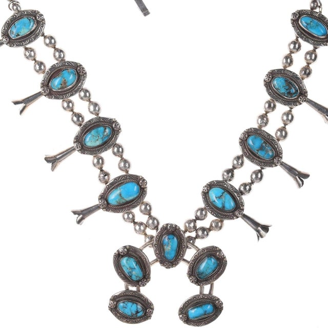 Vintage Native American silver and turquoise squash blossom necklace. 24" long<br>with 2 5/8" naja, no damage or...