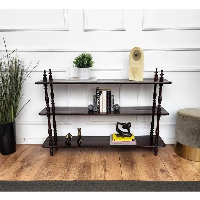 A beautiful Italian antique walnut three shelves, open bookcase or etagere standing on four great shaped carved turned...