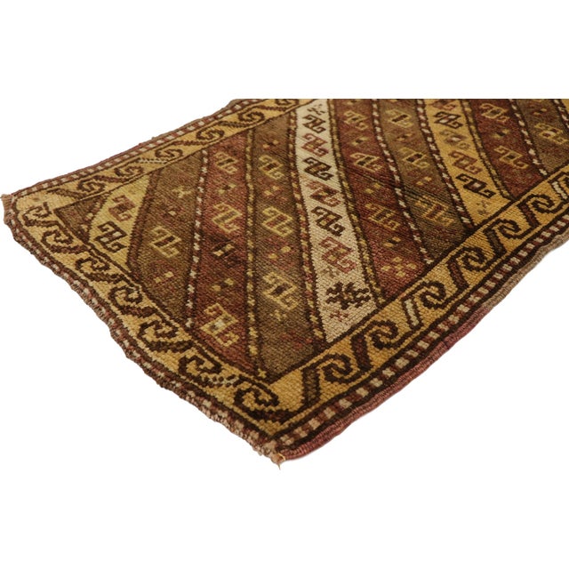 51180 Vintage Turkish Yastik Rug, 01'08 x 02'07. This captivating hand-knotted wool vintage Turkish Yastik rug is a...