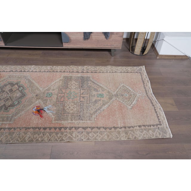 Type: Vintage Oushak Runner Rug Origin: Anatolian / Turkish (Handwoven) Technique: Hand-Knotted, Shaved / Distressed Low...