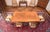 Spacious dining table in the Louis XV rococo style. The top is decorated with mirror-folded veneer, rich edge profiling...