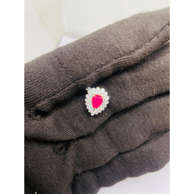 GEMSTONE DETAILS Gold Purity: 18K Solid Gold RUBY WEIGHT: 0.73 CTS DIAMOND WEIGHT: 0.64 CTS 18K GOLD NET WEIGHT: 1.60...