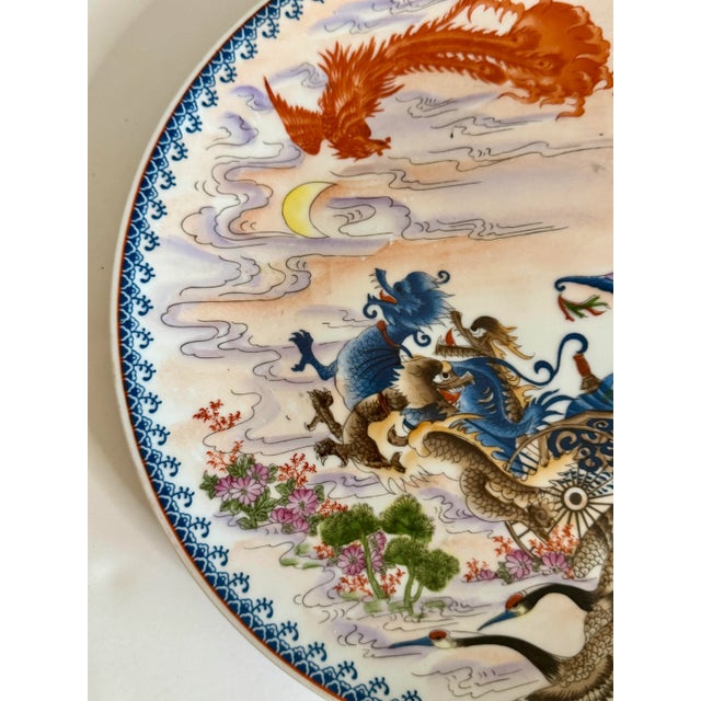 Late 20th Century Vintage Chinoiserie Porcelain Handpainted Wall Plate Numbered 1092 Wall Decor the Dragon Chariot For Sale - Image 5 of 10