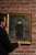An early illustration of a child, done in charcoal and framed in a gilt-painted wooden frame. This piece measures 19.75"W...