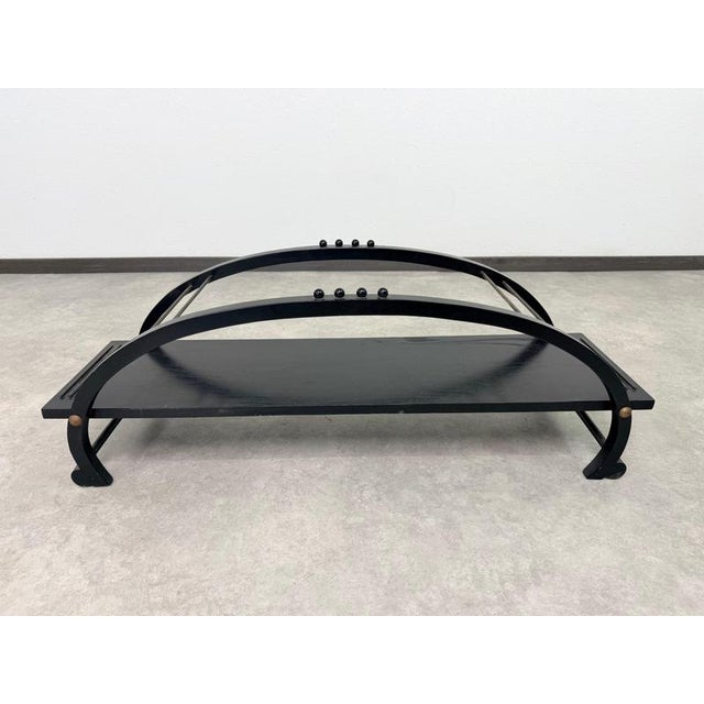 Elevate your interior curation with this distinctive postmodern tabletop shelf. Featuring an eye-catching double-arch...