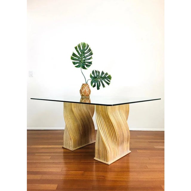 Vintage McGuire Twisted Rattan Double Pedestal Glass Top Dining Table Made of joined rattan "rods" with slightly twisted...
