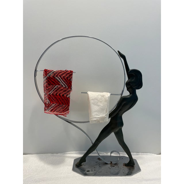 Elegant art deco store counter top display, circa 1930. This nude woman with the windswept hair may have been displaying...